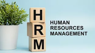 Essays on Personnel Selection Criteria and Work Breaks