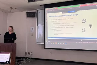 Melissa Steininger (H-BRS) stellt im NAIST-Japan Ergebnisse zum DAAD-PPP Projekts 'Multisensory Cues to Evoke Emotional Responses and Awe in Virtual Reality' vor