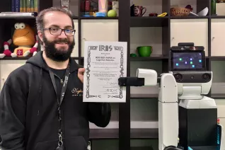 mitrevski-alex_iros_2020_best_paper_award_2020-11-07_foto_alex_mitrevski.jpg (DE)