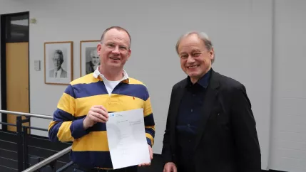 Wilhelm Schneider 25 Jahre Dienst mit Praesident 20240516 Foto Juri Kuestenmacher 06a.jpg