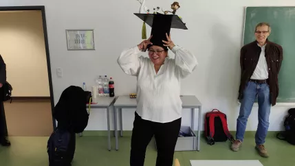 Iman Awaad with PhD hat