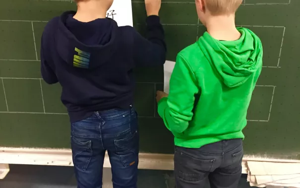 kinderuni_sta_chinesisch_23.11.17_30.jpg (DE)