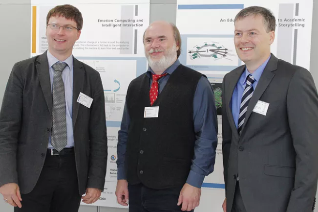 ivc-eroeffnung_rainer_herpers_philipp_slusallek_andre_hinkenjann._foto_johannes_wirz_12708.jpg (DE)