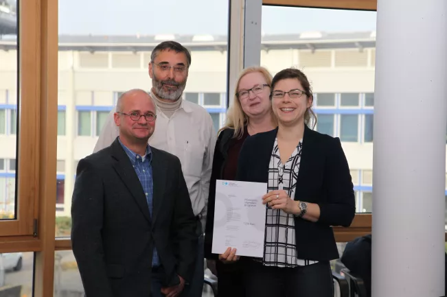 2017-11-22_asteroth-alexander_moeginger-bernhard_vp_geissler-margit_kehret-laura_promostipendiatin_foto_tritschler_1542.jpg (DE)