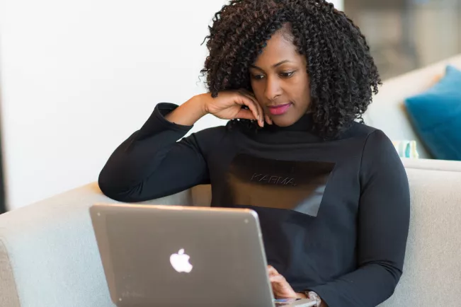 MBA Woman working at her laptop