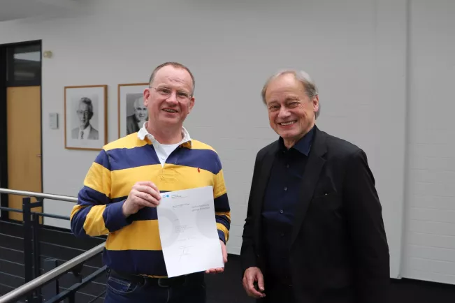 Wilhelm Schneider 25 Jahre Dienst mit Praesident 20240516 Foto Juri Kuestenmacher 06a.jpg