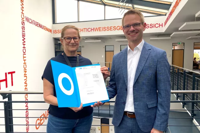 Ernennung Andreas Ortseifen IWK mit Marion Halfmann 20251212 Foto Dominik Pieper