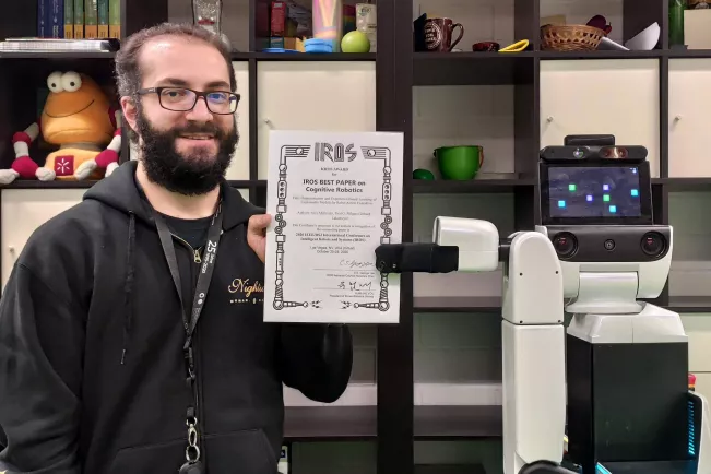 mitrevski-alex_iros_2020_best_paper_award_2020-11-07_foto_alex_mitrevski.jpg (DE)